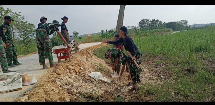 Arco alat bantu yang selalu menemani anggota satgas TMMD ke114 dalam pengurukan sisi jalan